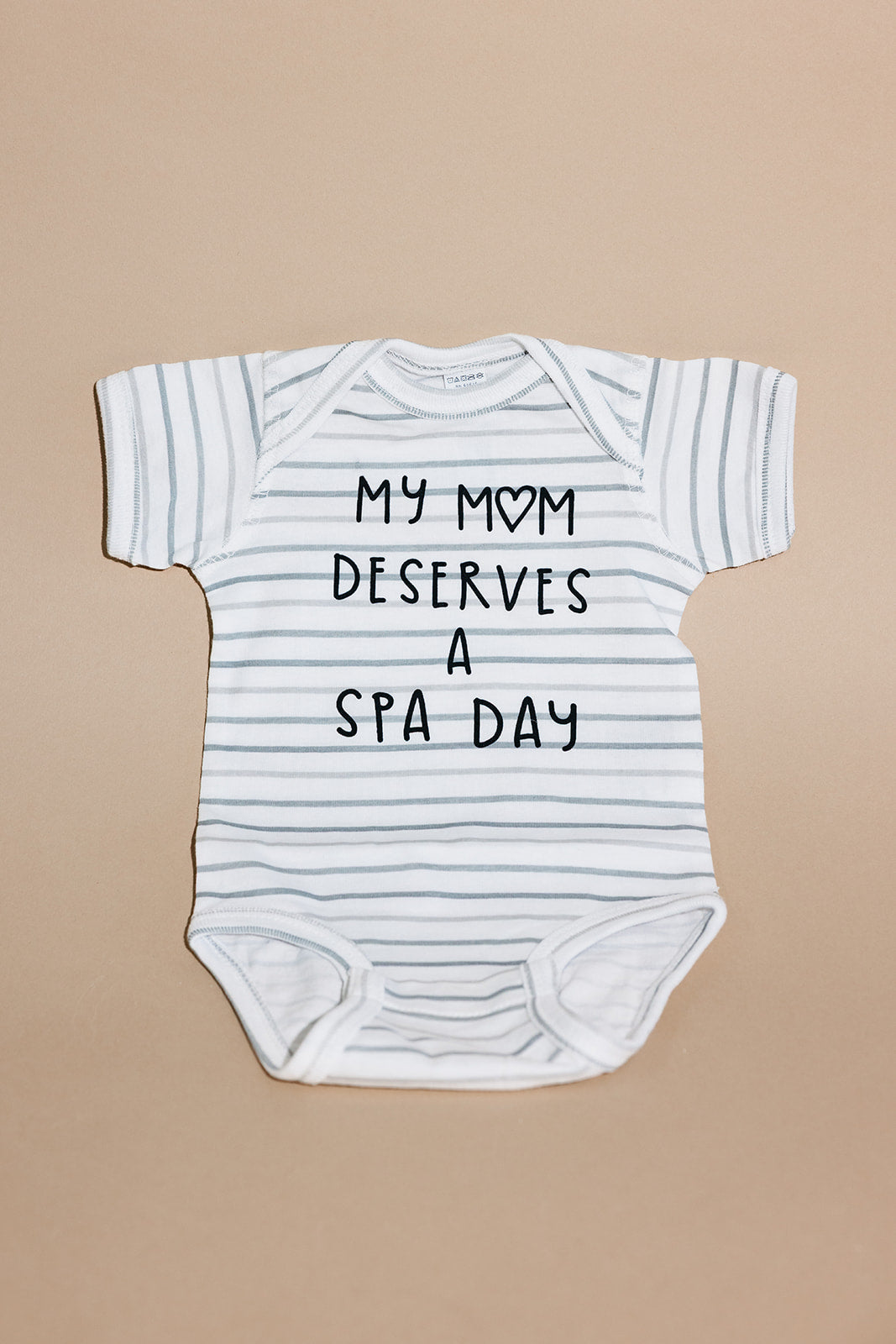 Mom Deserves A Spa Day Baby Onesie | Lucky Owl