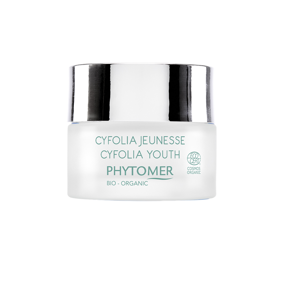 Jar of Cyfolia Youth Glow Renewing Wrinkle Cream | Phytomer in frosted glass with silver lid, featuring organic skincare designed for youthful skin glow.
