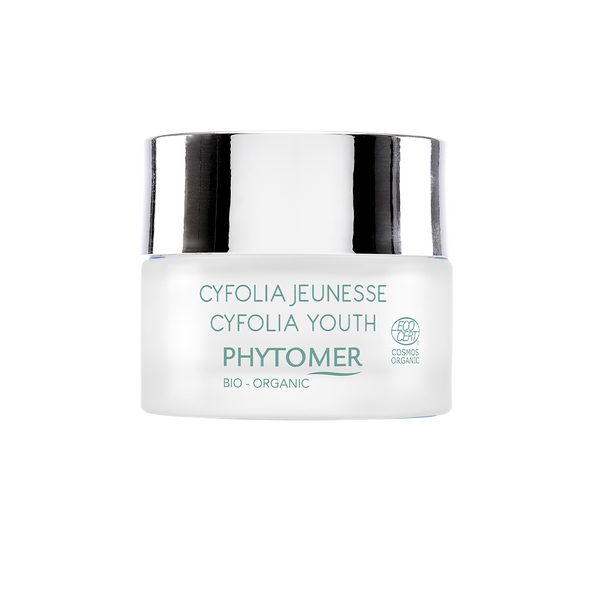 Jar of Cyfolia Youth Glow Renewing Wrinkle Cream | Phytomer in frosted glass with silver lid, featuring organic skincare designed for youthful skin glow.