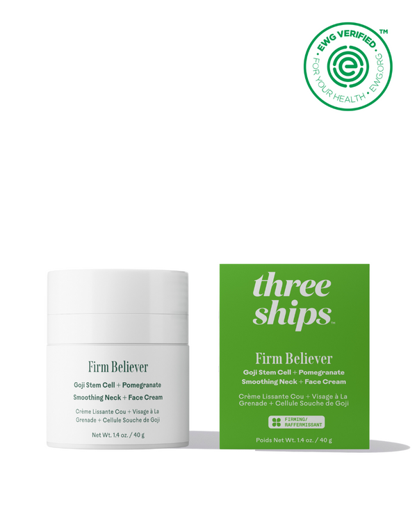 White container and green box of Firm Believer Goji Stem Cell + Pomegranate Smoothing Neck + Face Cream | Three Ships with EWG verified logo for clean skincare.
