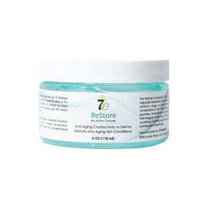 Jar of ReStore Conductive Gel with Bio-Active Complex | 7e Wellness featuring light blue gel in a clear container with white lid, designed for skincare and anti-aging treatments.