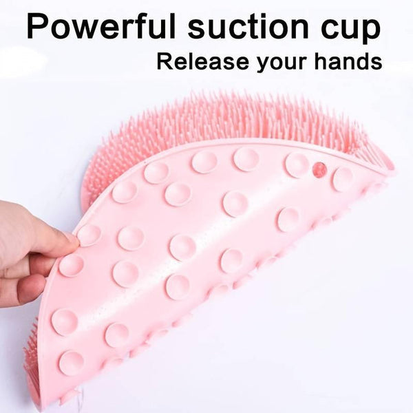 Close-up of a pink Back & Foot Scrubber | Dreambox Beauty with flexible silicone bristles and powerful suction cups designed for hands-free body care and skincare routines.