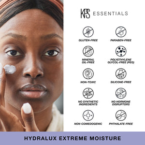 Close-up of a person applying Hydralux Extreme Moisture | Kindness Powered Skincare cream to their cheek, alongside icons highlighting the product’s gluten-free, paraben-free, mineral oil-free, polyethylene glycol-free, non-toxic, silicone-free, no synthetic ingredients, no hormone disruptors, non-comedogenic, and phthalate-free qualities.