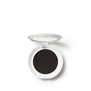 Open compact of PureBrow Brow Powder | Jane Iredale showing deep black brow powder in a white round case against a white background.