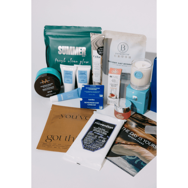 2026 Wellness Month Box ($1,140+ Value) | Live Love Spa featuring an assortment of skincare, body care, wellness supplements, and recovery tools in various packaging and containers.