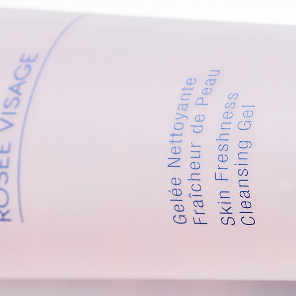 Close-up of a skincare product label showing Rosée Visage Skin Freshness Cleansing Gel | Phytomer in soft pastel colors promoting gentle cleansing and skin freshness.
