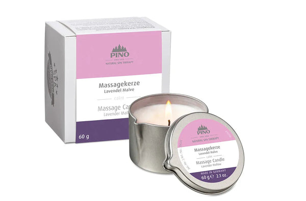 Small lit Massage Candle | Pino Spa Therapy in a silver tin with lavender malve scent, displayed alongside its white and purple packaging box for skincare and body care wellness.