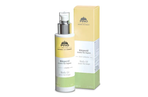Bottle and packaging of Body Oil | Pino Spa Therapy in light green and yellow tones, highlighting natural skincare and body care with green tea and ginger ingredients.