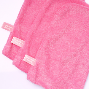 Soft pink microfiber cleansing mitts designed for gentle skincare and body care, featuring the Cleansing Mitt [Double Cleansing Tool] | Dreambox Beauty label.
