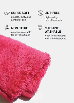 Close-up of a vibrant pink Cleansing Mitt [Double Cleansing Tool] | Dreambox Beauty made from super soft, lint-free microfiber that is non-toxic and machine washable for gentle skincare.