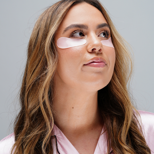 Woman wearing Hydrating Reusable Under Eye Patches | Dreambox Beauty in a skincare routine, promoting hydration and wellness for the under-eye area.