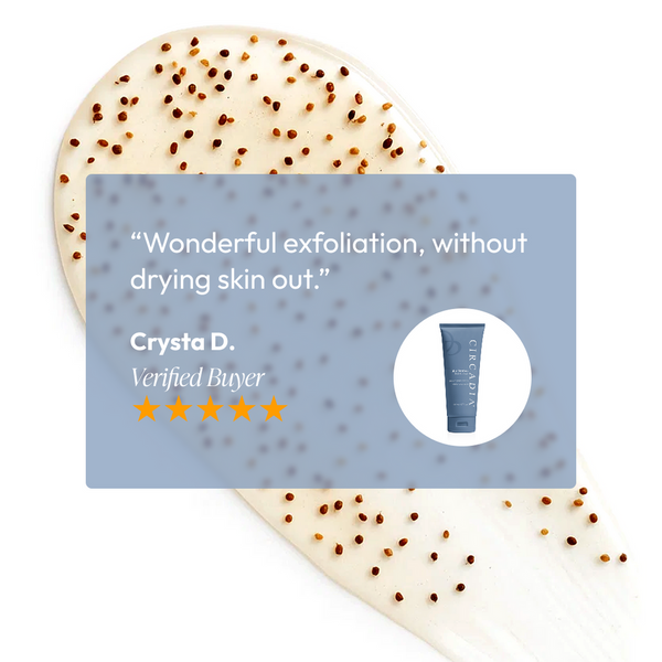 Close-up of exfoliating cream with small brown natural exfoliant particles, featuring a customer review highlighting gentle exfoliation by Blue Bamboo Exfoliator for Body | Circadia.
