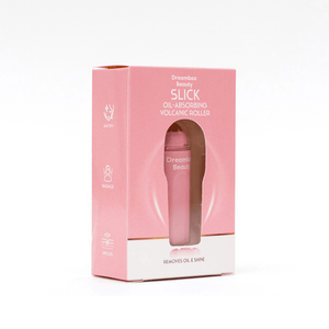 Packaging of the Slick Oil Absorbing Volcanic Roller [Removes Oil & Shine] | Dreambox Beauty, a pink skincare tool designed to absorb oil and reduce shine for a refreshed complexion.