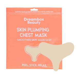 Packaging of Skin Plumping Reusable Chest Pad | Dreambox Beauty in coral color, highlighting skincare benefits for smoother, glowing skin, with an included beige chest pad.