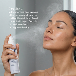 Woman with closed eyes sprays Licorice & Bearberry Brightening Mist | Circadia on her face demonstrating skincare use for morning and evening refreshment.