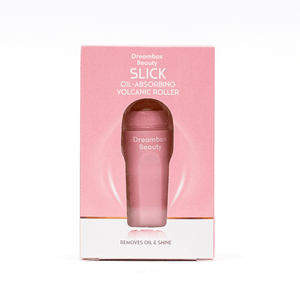 Slick Oil Absorbing Volcanic Roller [Removes Oil & Shine] | Dreambox Beauty in pink packaging designed for effective skincare to absorb oil and reduce shine.