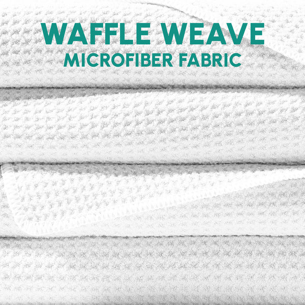 Close-up of white waffle weave microfiber fabric showcasing the texture and softness of the Waffle Microfiber Beach Towel - Curl | SUN'Y.
