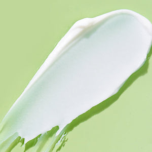 Smooth, creamy texture of BIOME+ smoothing cloud crème | IMAGE Skincare spread on a light green background, highlighting its skincare and body care benefits.
