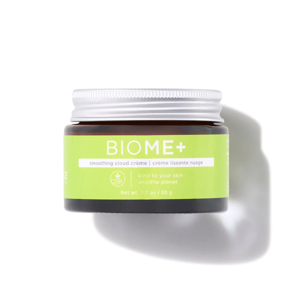 Jar of BIOME+ smoothing cloud crème | IMAGE Skincare with a green label, displayed on a white background, highlighting skincare and wellness.