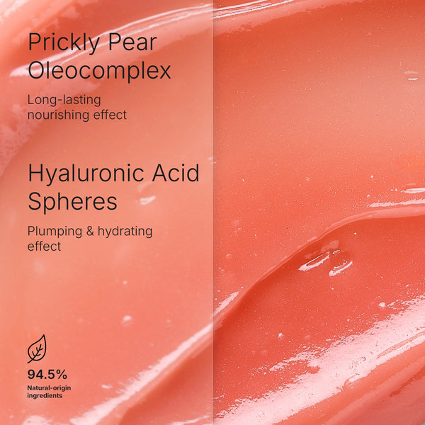 Close-up of soft coral-colored balm texture highlighting key ingredients Prickly Pear Oleocomplex for long-lasting nourishment and Hyaluronic Acid Spheres for plumping and hydrating in Hydramemory Plumping Lip Balm | [ comfort zone ].