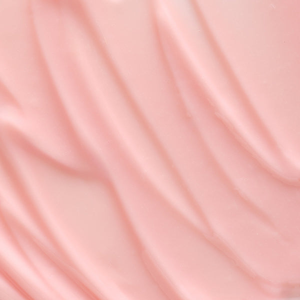 Close-up of smooth, glossy pink lip mask gel texture representing Hydramemory Hydraboost Lip Mask | [ comfort zone ] skincare product.
