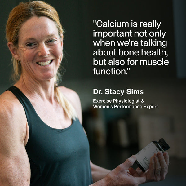 Calcium wellness supplement bottle held by Dr Stacy Sims alongside a quote about bone health and muscle function
