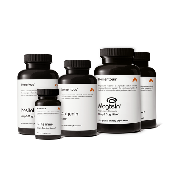 Collection of five dietary supplement bottles labeled with sleep and cognitive support ingredients displayed together as the Complete Sleep Stack for wellness and recovery.