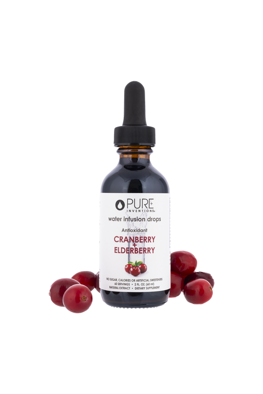 Bottle of Super Fruit Extracts Water Infusion Drops - Cranberry + Elderberry | Pure Inventions surrounded by fresh cranberries, highlighting antioxidant wellness supplement benefits.