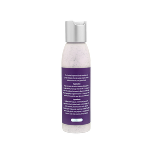 Back view of a skincare bottle with detailed instructions and ingredients for Crushed Grapeseed Scrub | Skin Fitness Therapy, a body care product with natural exfoliants in a white bottle with a silver cap.