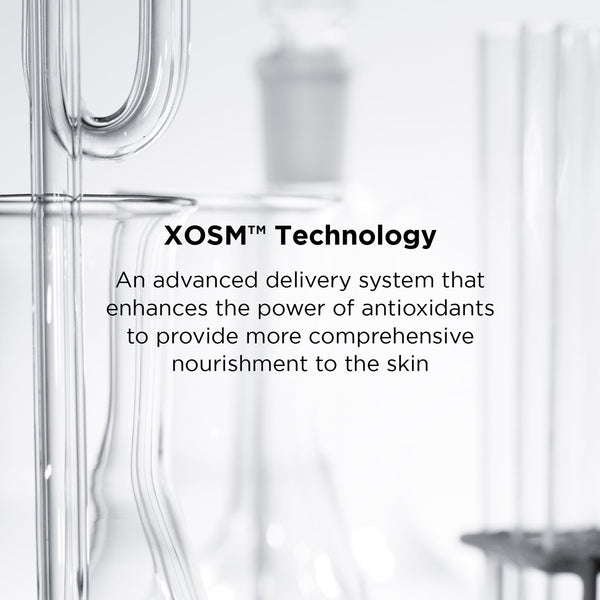 Close-up of clear laboratory glassware with text describing XOSM™ Technology as an advanced delivery system that enhances antioxidants for better skin nourishment, promoting DAILY PREVENTION pure mineral tinted moisturizer SPF 30 | IMAGE Skincare.