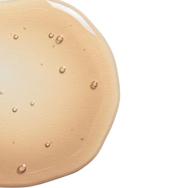 Close-up of a light beige serum drop with small air bubbles representing EGF Protein Complex | Skin Fitness Therapy for skincare and wellness supplements.