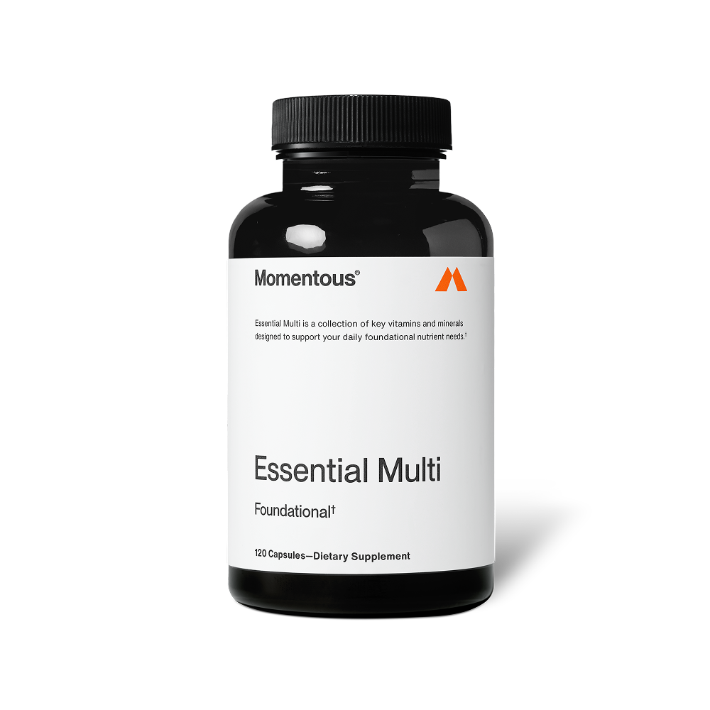 Black bottle of Multivitamin dietary supplement with a white label displaying essential vitamins and minerals for daily wellness support