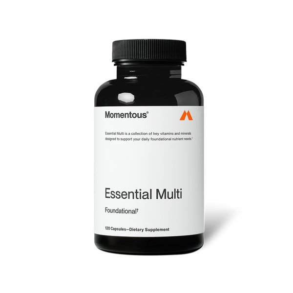 Black bottle of Multivitamin dietary supplement with a white label displaying essential vitamins and minerals for daily wellness support