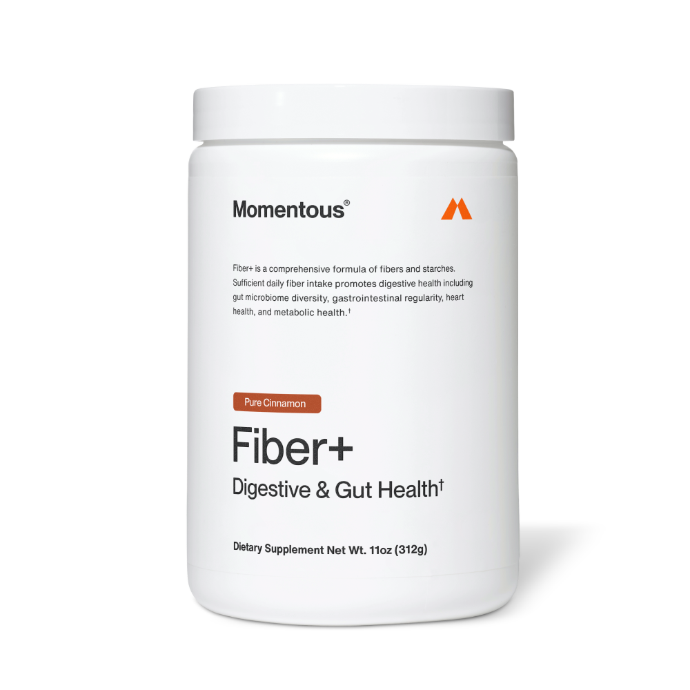 Container of Fiber+ dietary supplement in pure cinnamon flavor by Momentous, promoting digestive and gut health with a comprehensive fiber and starch formula.
