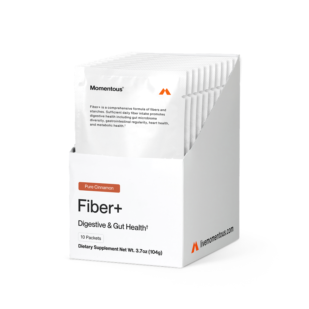 Box of Fiber+ 10-Travel Packs dietary supplements in pure cinnamon flavor, designed to support digestive and gut health with a white and orange minimalist packaging.