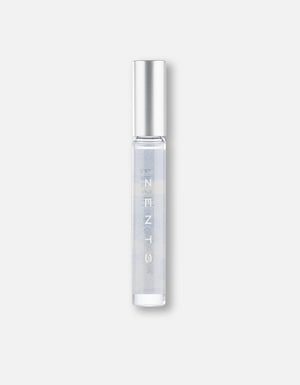 Clear cylindrical roll-on bottle with silver cap containing fragrance oil, labeled Attar Roll-on Scent | Zents, ideal for personal body care and wellness use.