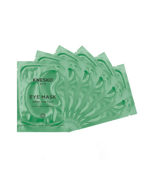 Pack of six green skincare packets of Green Jade Eye Mask | KNESKO, designed for calming and refreshing the skin around the eyes as a wellness body care product.