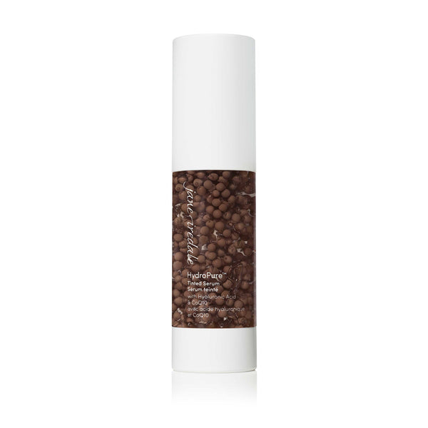 Bottle of HydroPure™ Tinted Serum with Hyaluronic Acid & CoQ10 | Jane Iredale featuring a sleek white cap and brown-tinted serum visible through the clear container, highlighting skincare product design.