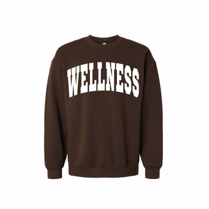 Wellness Varsity Unisex Crew Neck Sweatshirt | Lucky Owl in dark brown with bold white "WELLNESS" text across the chest, featuring a casual comfortable fit and ribbed cuffs and hem.