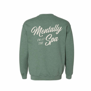 Back view of a green sweatshirt with the phrase "Mentally I'm At The Spa" printed in large, elegant white script, Mentally I’m At The Spa Unisex Crew Neck Sweatshirt | Lucky Owl.