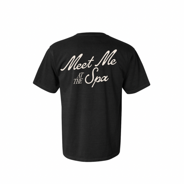 Black unisex t-shirt with retro-style cream lettering on the back reading "Meet Me At The Spa" featuring the full product title Meet Me At The Spa Retro Unisex T-Shirt | Lucky Owl.