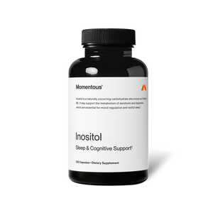 A black bottle of Inositol dietary supplement by Momentous featuring sleep and cognitive support, designed for wellness and mood regulation.