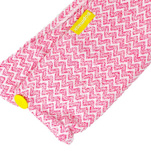 Pink textured microfiber fabric with zigzag pattern and yellow button detail, part of the Microfiber Hair Turban | Popmask designed for skincare and wellness routines.