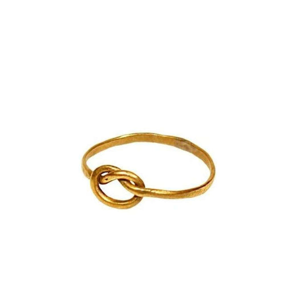 Delicate gold knot ring with a simple band design, symbolizing connection and elegance, from the Knot Ring | Purpose Jewelry collection.
