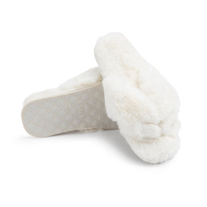 Pair of soft, plush white flip-flops with a quilted sole designed for comfort and relaxation in the Waterfront Solid Faux Fur Flip-Flop - White | Lemon style.