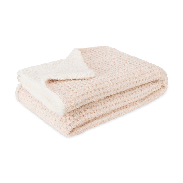 Folded soft textured blanket with sherpa lining in a light cream color, styled to complement the 3pc Women's Sherpa Lined Cozy Waffle Set | Lemon for added warmth and comfort.