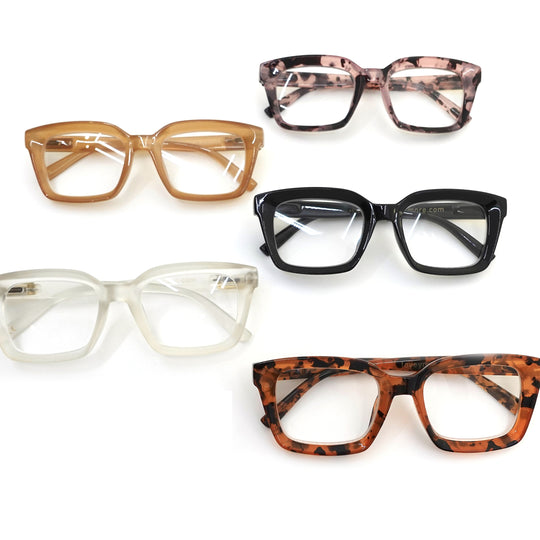 Five pairs of Chic Trendy Reading Glasses | Love You More in various stylish frames including tortoiseshell, black, clear, amber, and pink patterned designs arranged on a white background.