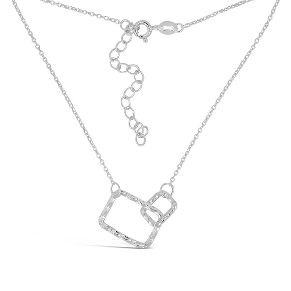 Silver necklace featuring two interconnected textured rectangular pendants on a delicate chain with adjustable clasp, Geometry Rectangles Necklace | Little Sparkles