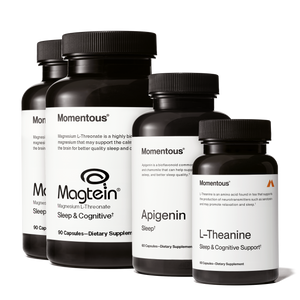Four black supplement bottles labeled Momentous including Magtein, Apigenin, and L-Theanine arranged in a row promoting Nightly Sleep Stack for sleep and cognitive support.