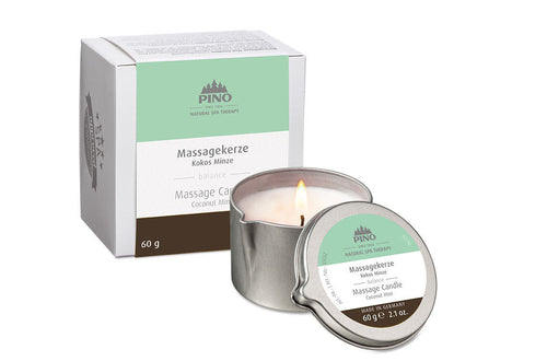 Massage Candle | Pino Spa Therapy in a silver tin with a lit wick, featuring coconut mint scent, shown beside its white and mint green packaging box for skincare and body care.